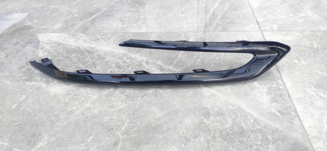 23RX radiator grille side trim